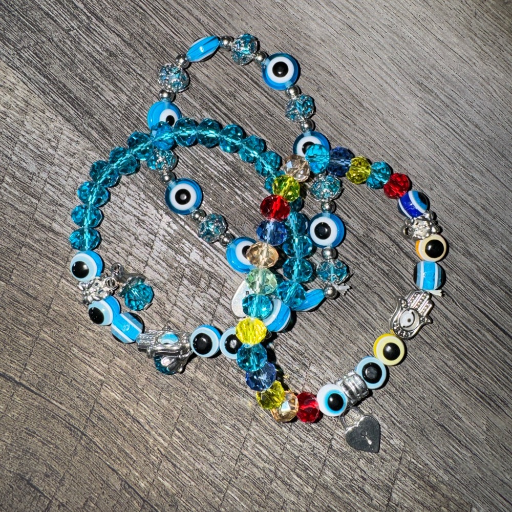 3 evil eye beaded bracelets.